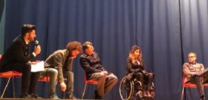 Il palco con i relatori (Marco Scarponi il secondo da sinistra)