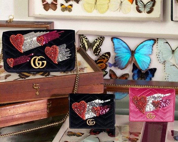 Pochette e portafogli Gucci impreziositi di applique